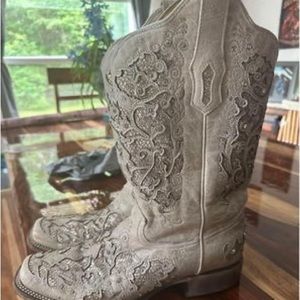 Women’s coral cowboy boots size 11 worn twice.